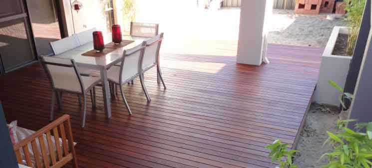 This mahogany deck provides the perfect alfresco dining area.