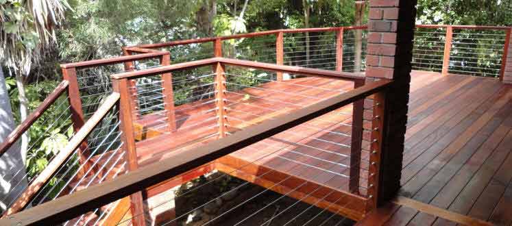 Raised Hardwood decking with Staircase and stainless steel wire railings