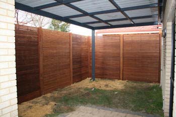 Old concrete fencing now completely 'screend' with the new screen panels.