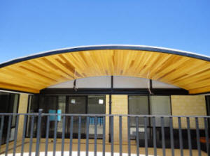Solid Cedar timber ceiling on domed surface. The arc shape was no problem for our carpenters.