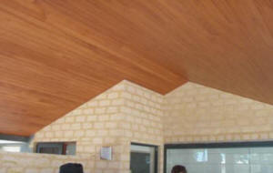 The timber lined ceiling of Glosswood, contrasts well with the supporting wall.